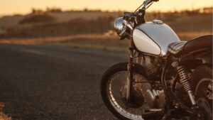 Motorcycle parked on an open desert road at sunset in Arizona, representing Sun City motorcycle accident risks.